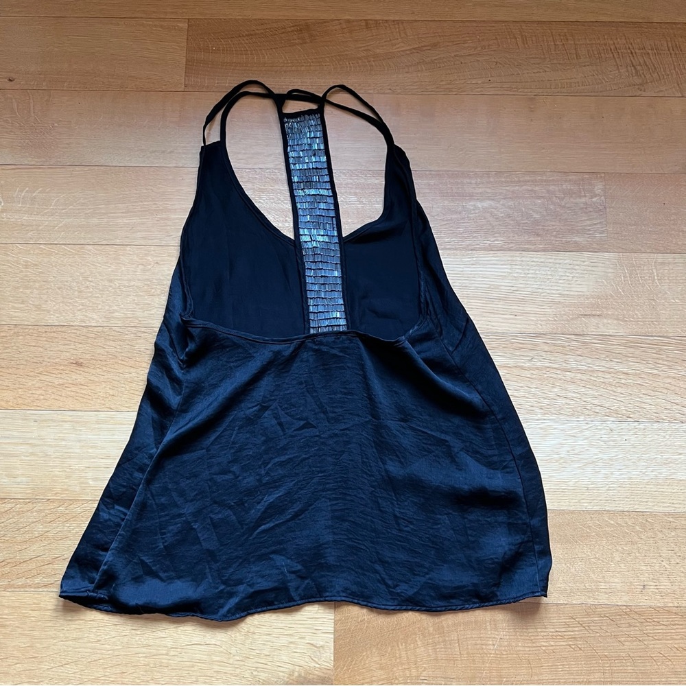 Inedita low back, black blouse Size M with sequin detail